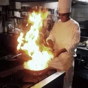 Common causes of restaurant kitchen fires in Hawaii include grease buildup from improper exhaust hood cleaning.