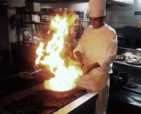 Common causes of restaurant kitchen fires in Hawaii include grease buildup from improper exhaust hood cleaning.